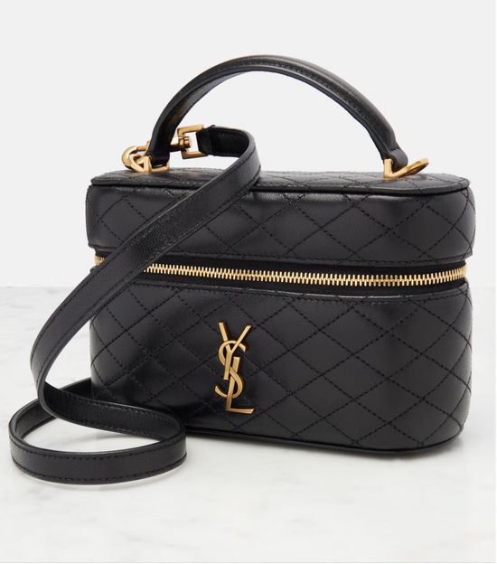 Black quilted handbag with gold zipper and YSL logo on a white background