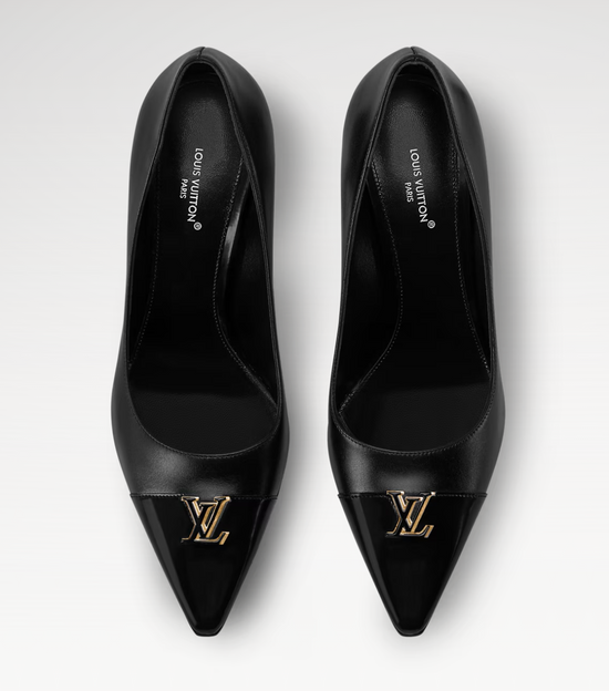 Pair of black high-heeled shoes with gold Louis Vuitton logo on a white background