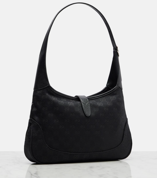Black handbag on a white background