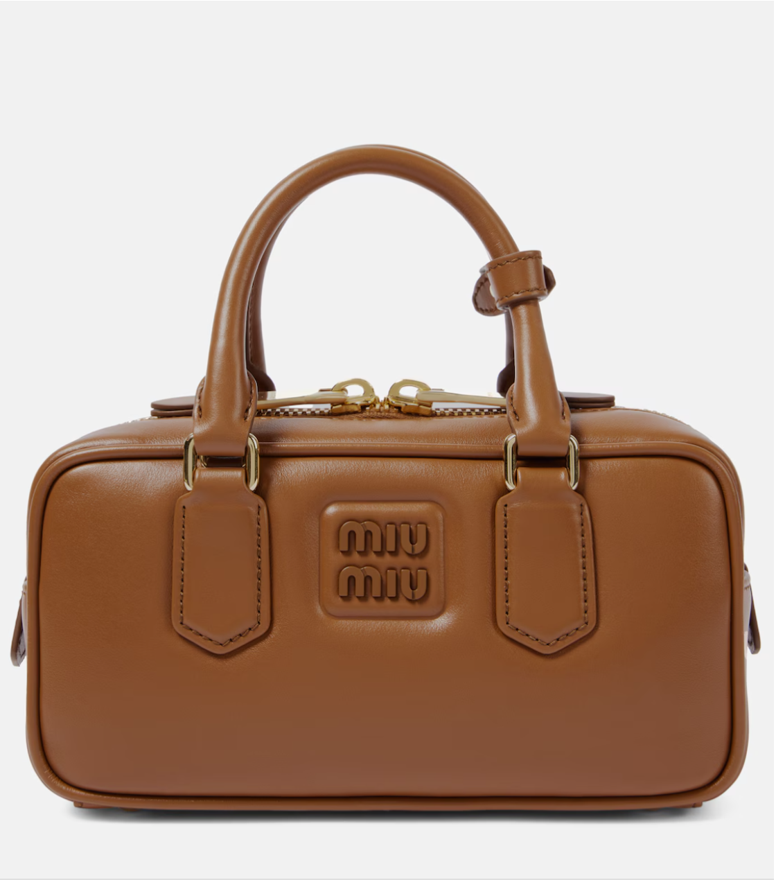 Brown leather handbag with gold accents on a white background