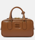 Brown leather handbag with gold accents on a white background
