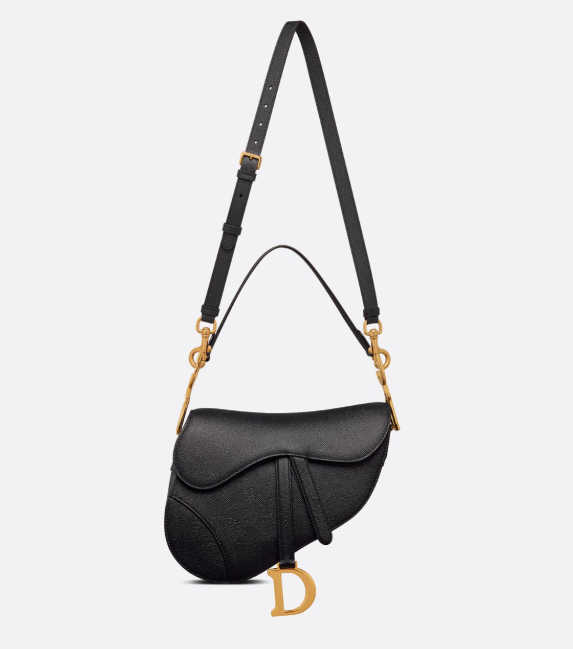 Black handbag with gold accents on a light gray background