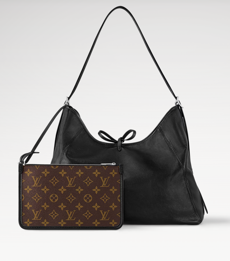 Black handbag with a matching pouch featuring Louis Vuitton monogram pattern on a light gray background