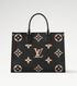 Black handbag with beige monogram pattern on a white background