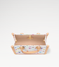 Open suitcase with multicolor pattern on a light gray background