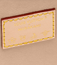Louis Vuitton x Murakami label on a beige background