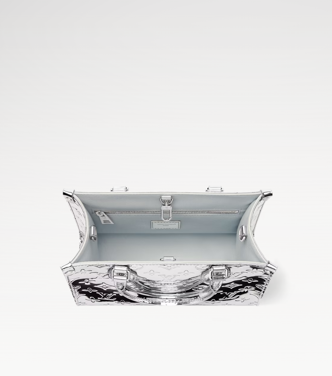 Clear bag with metallic accents on a white background