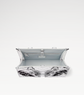 Clear bag with metallic accents on a white background