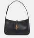 Black handbag with a gold YSL logo on a white background