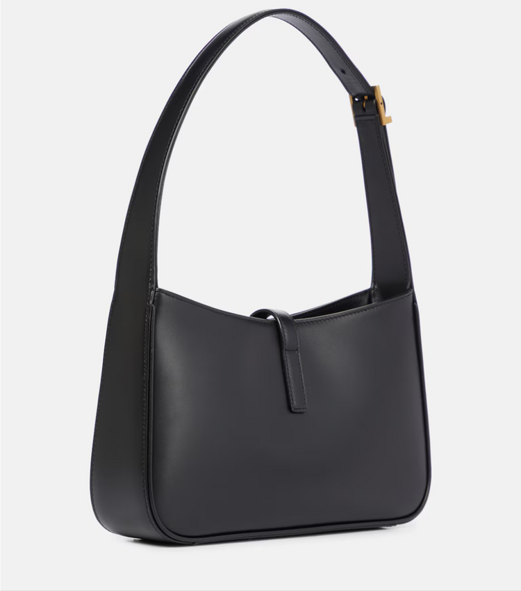 Black shoulder bag on a light gray background