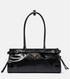 Black handbag with a brand logo on a white background