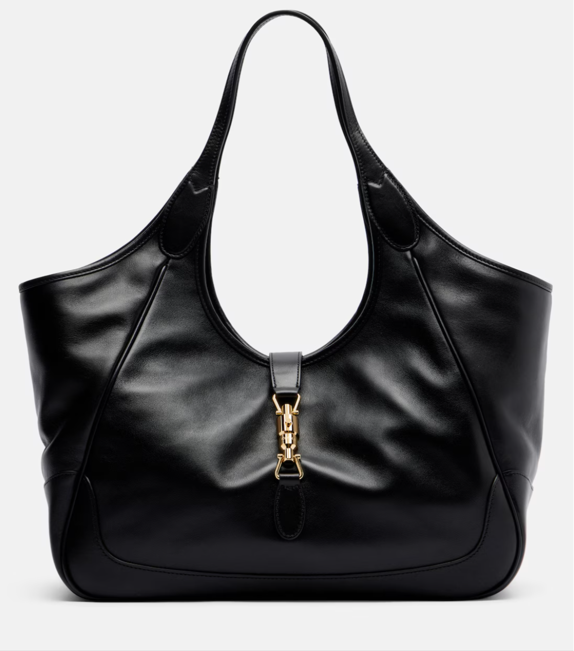 Black leather gucci handbag with gold clasp on a light gray background
