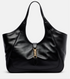 Black leather gucci handbag with gold clasp on a light gray background