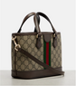 Designer handbag with GG pattern and red and green stripe on a light gray background