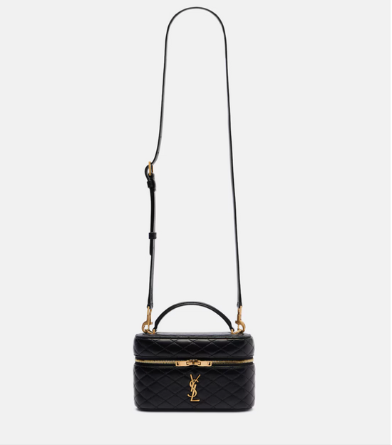 Black quilted YSL handbag with gold accents on a white background