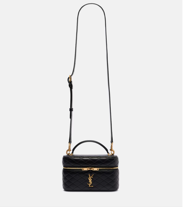 Black quilted YSL handbag with gold accents on a white background