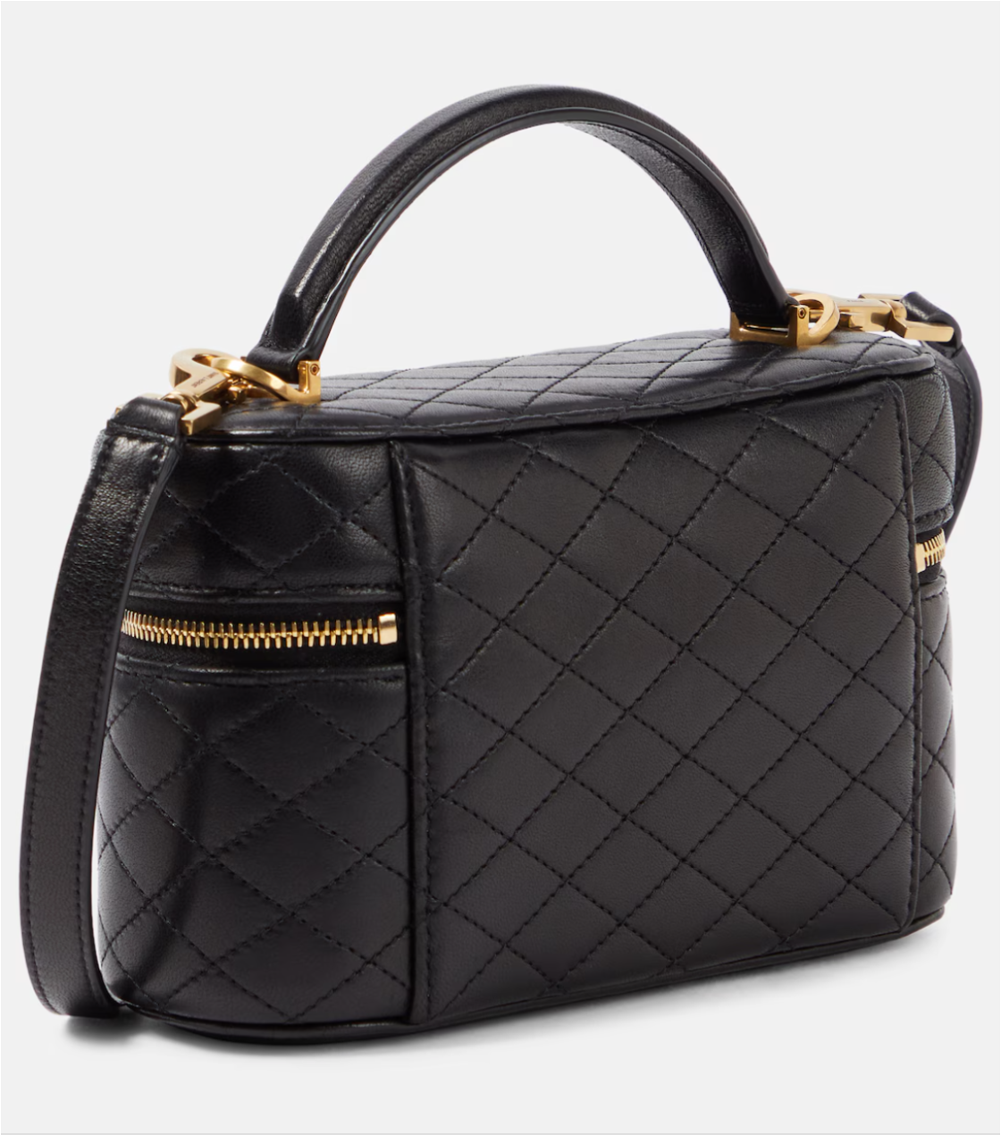 Black quilted handbag with gold accents on a light gray background