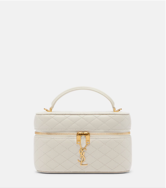 Quilted beige handbag with gold accents on a white background