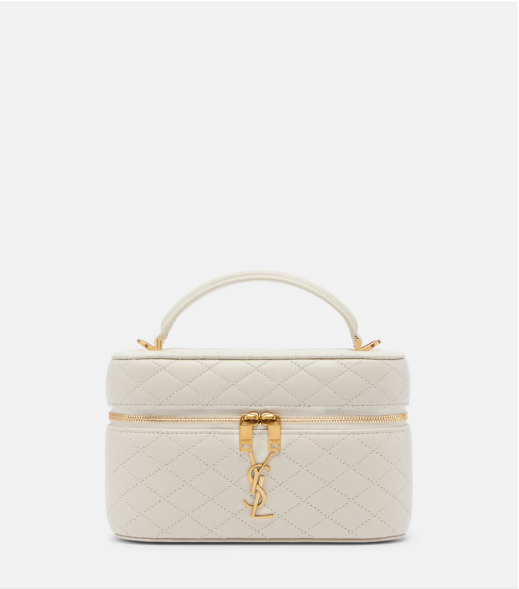 Quilted beige handbag with gold accents on a white background