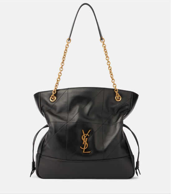 Black handbag with gold chain strap and YSL logo on a white background