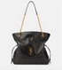 Black handbag with gold chain strap and YSL logo on a white background