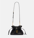 Black leather YSL handbag with a drawstring and gold chain strap on a white background
