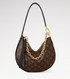 Designer handbag with monogram pattern and gold chain detail on a white background