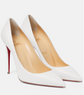 White high-heeled shoes with red soles on a white background