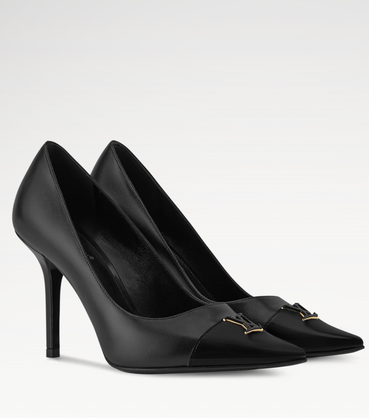 Black high-heeled shoes with a gold LV buckle on a white background