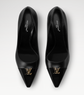 Pair of black high-heeled shoes with gold Louis Vuitton logo on a white background