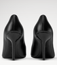 Pair of black high-heeled shoes on a white background