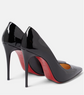 Black high-heeled shoes with red interior on a white background