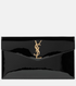 Black clutch bag with gold logo on a white background