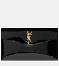 Black clutch bag with gold logo on a white background