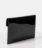 Black clutch bag on a white background