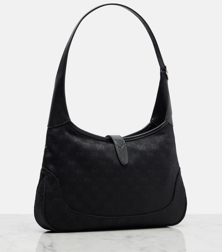 Black handbag on a white background
