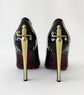 Black high-heeled shoes with gold sword designs on a white background